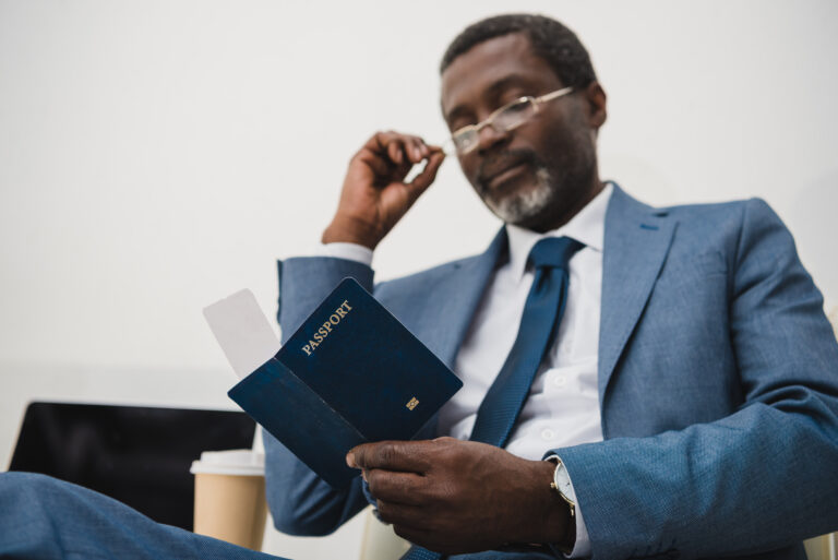an asylum lawyer looking at a client's passport